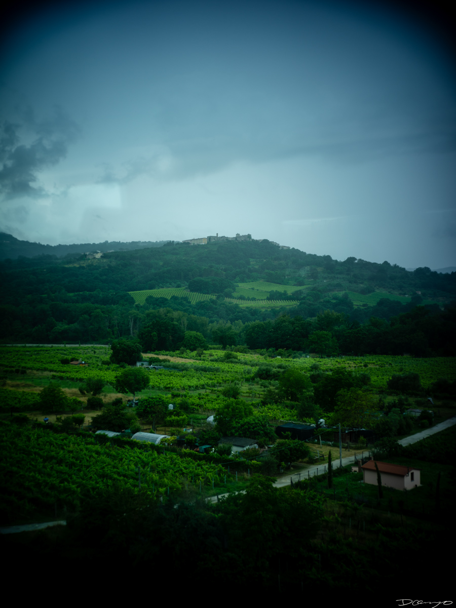 Photos from a trip through Italy in Summer of 2023. Locations include Rome, Florence, Tuscany, Castello di Bossi in Chianti, Siena, San Gimignano, Sirmione on Lake Garda, Bologna, Gudon, Italian Dolomites, Seceda, Cadini di Misurina, and Venice.
